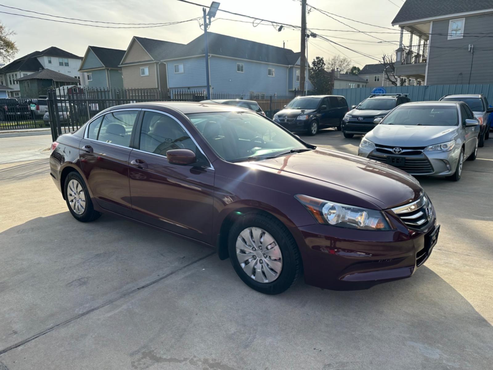 2012 Maroon /Beige Honda Accord LX (1HGCP2F33CA) with an 2.4L engine, Automatic transmission, located at 1501 West 15th St., Houston, 77008, (713) 869-2925, 29.797941, -95.411789 - Photo #1